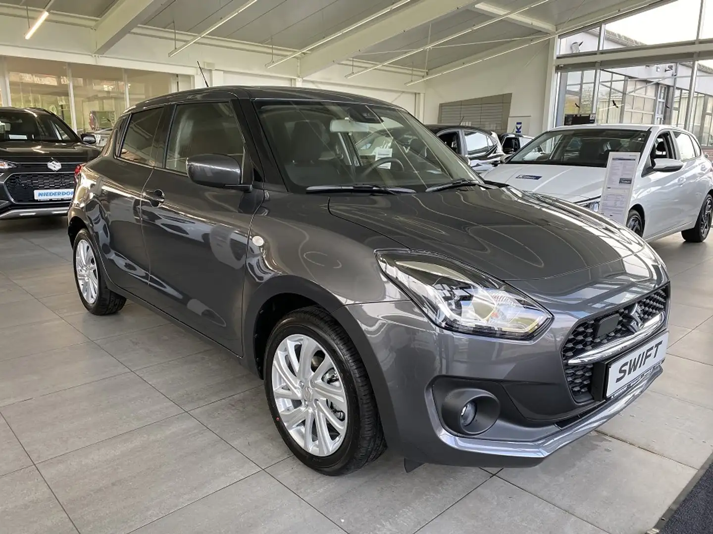 Suzuki Swift 1.2 Comfort Klima, Sitzh., DAB, ACC Gris - 1