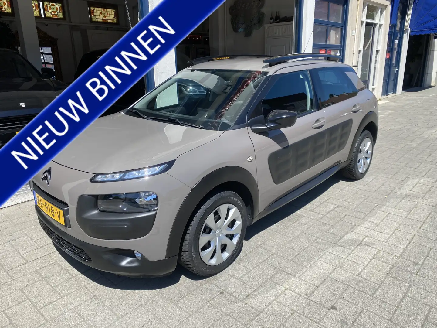 Citroen C4 Cactus 1.2 PureTech Feel NL AUTO/NAVI/CLIMA/CRUISE/NW APK Marrón - 1