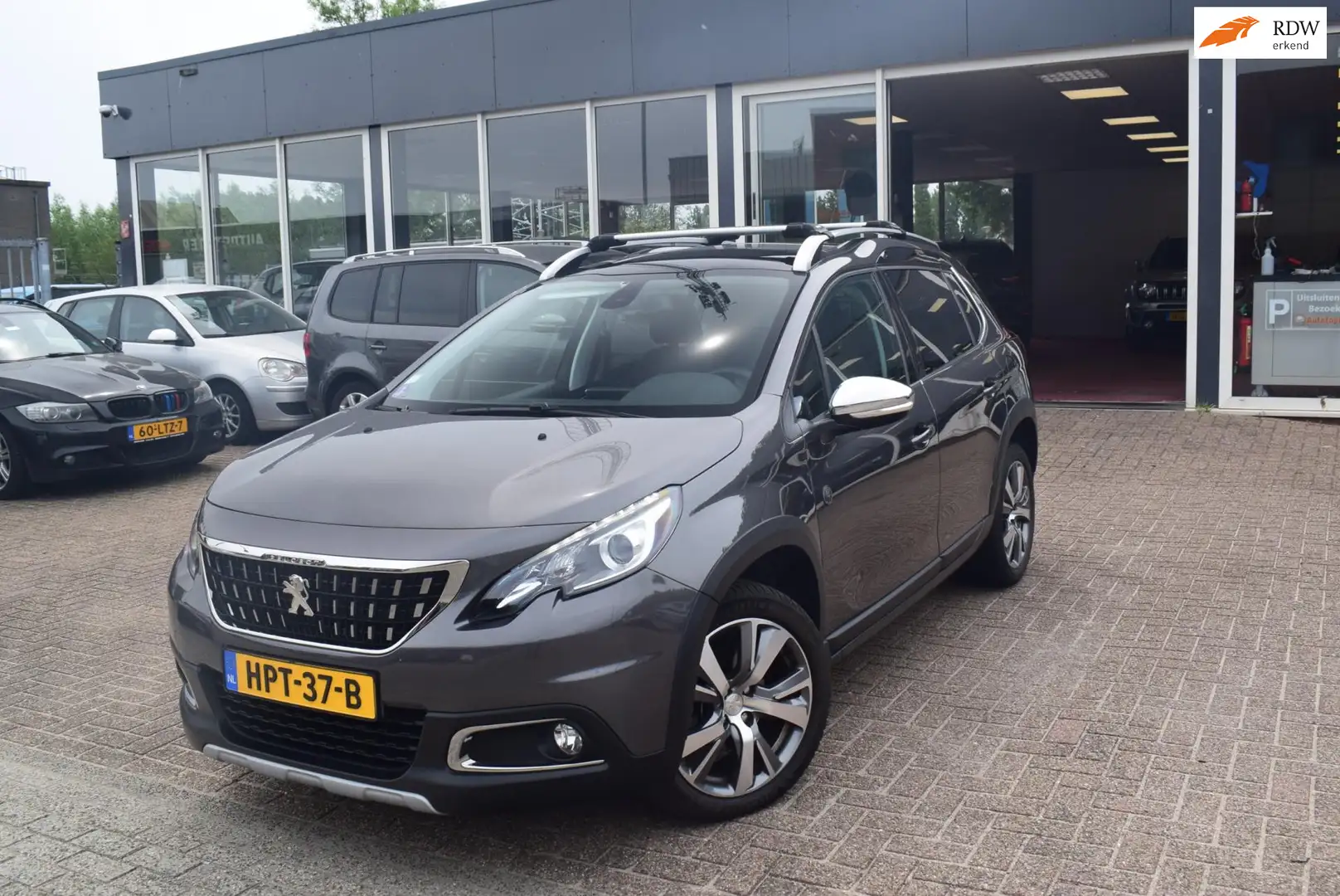 Peugeot 2008 1.2 PureTech Crossway |AUTOMAAT | NAVI| HALF LEDER Grau - 1