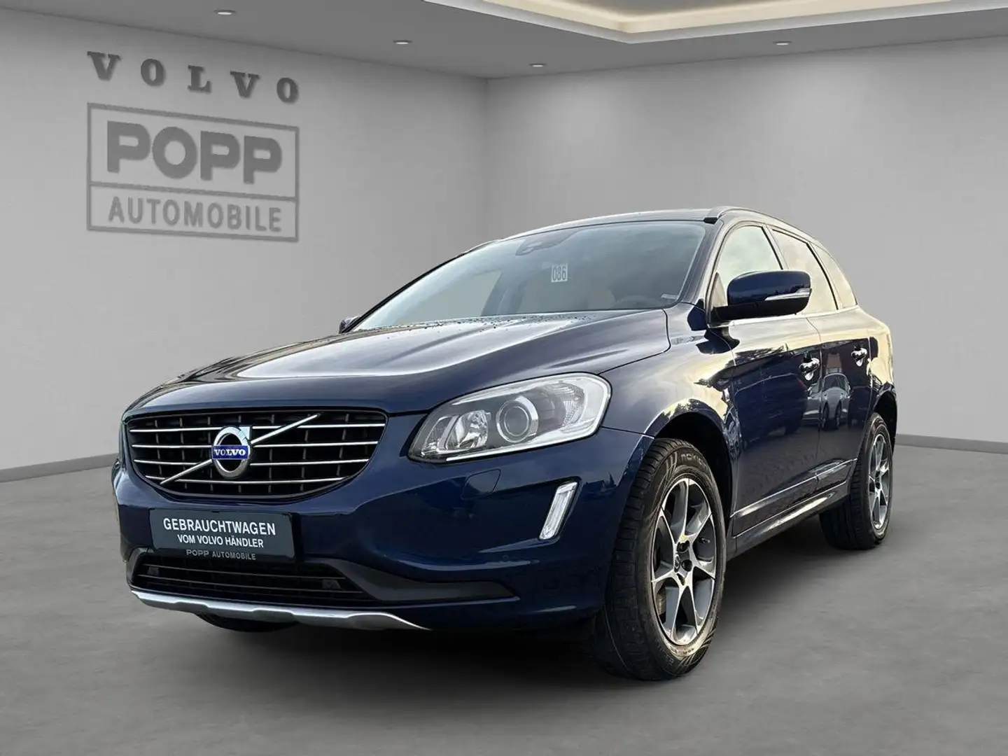 Volvo XC60 D5 AWD Ocean Race CAM PANO BI-XENON SHZ Blauw - 1