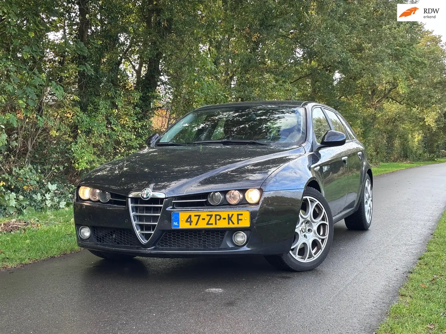 Alfa Romeo 159 Sportwagon 1.9 JTD Impression | Cruise + Airco Nu Zwart - 1