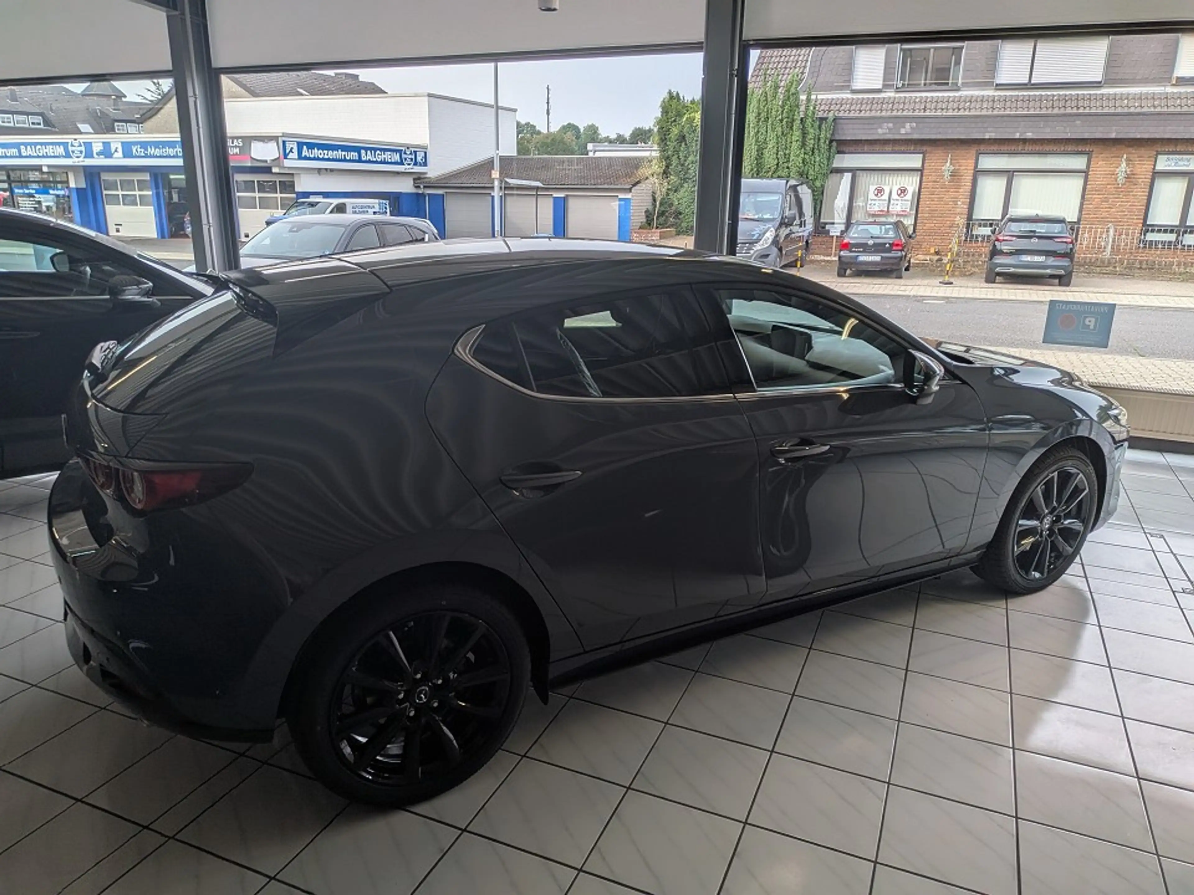 Mazda 3 2.5L e-SKYACTIV G 140ps Homura — photo 7