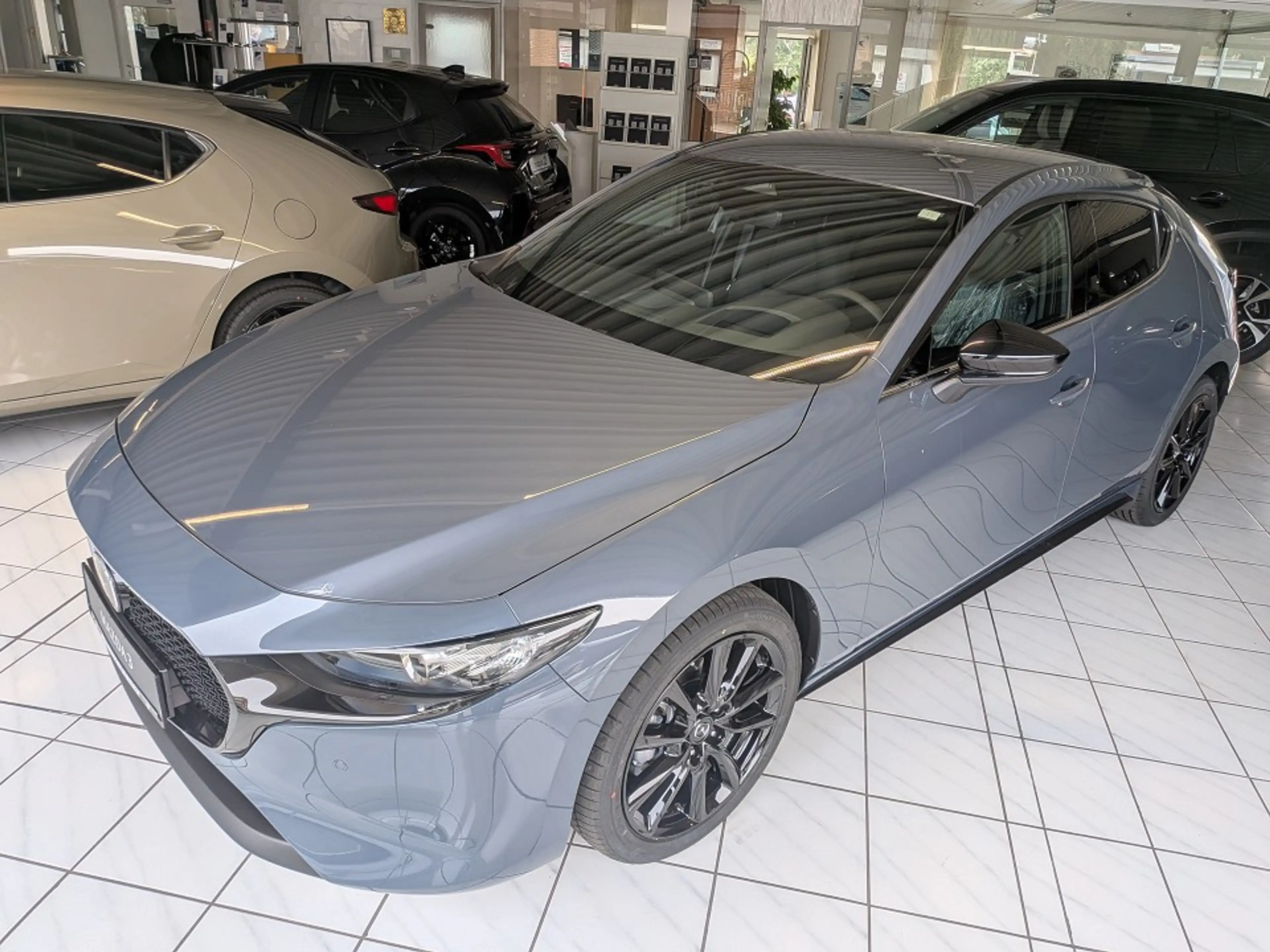 Mazda 3 2.5L e-SKYACTIV G 140ps Homura — photo 2