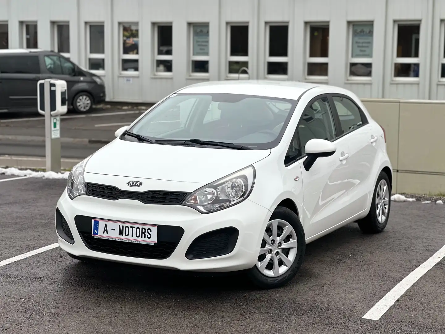 Kia Rio 1,2 CVVT Cool Limousine Weiß - 1