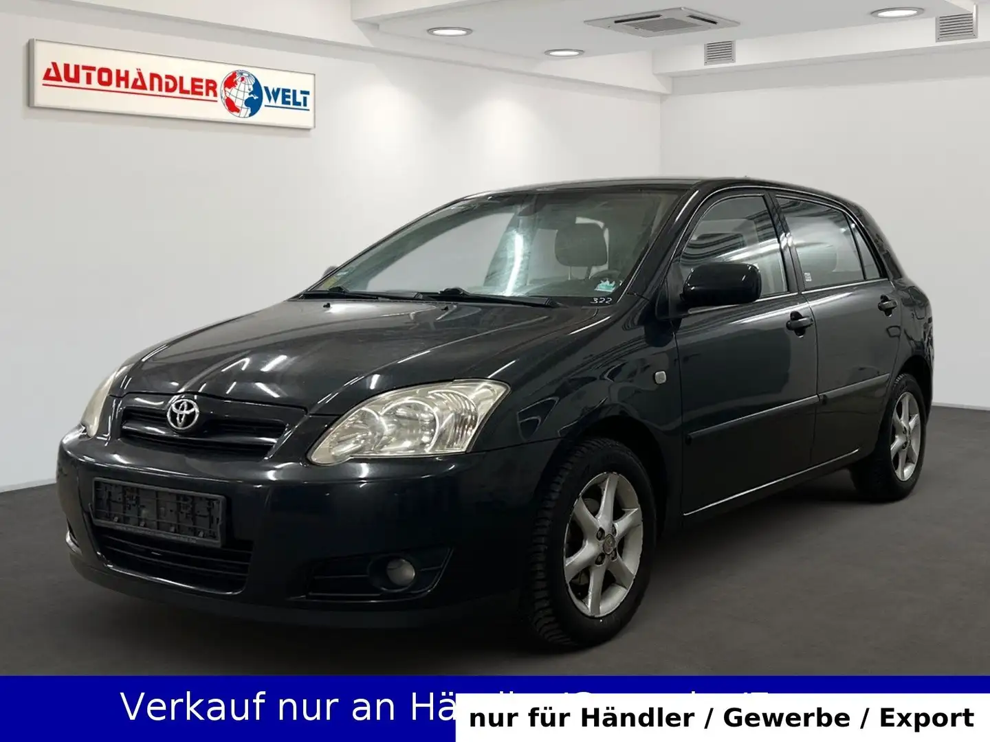 Toyota Corolla 1.4 i 5-trg. Klimaautomatik Schwarz - 1