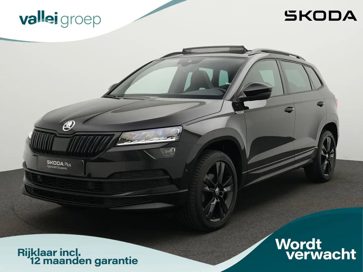 Skoda Karoq 1.5 TSI 150 pk DSG Sportline Business | Panoramada Zwart - 1