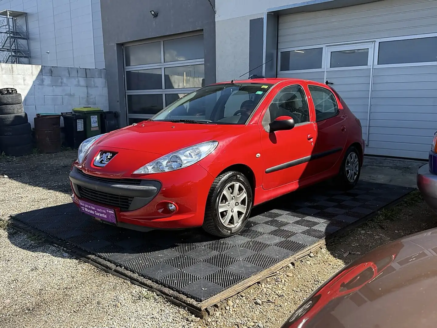 Peugeot 206 + 1,4 HDI 70 Trendy Rot - 1