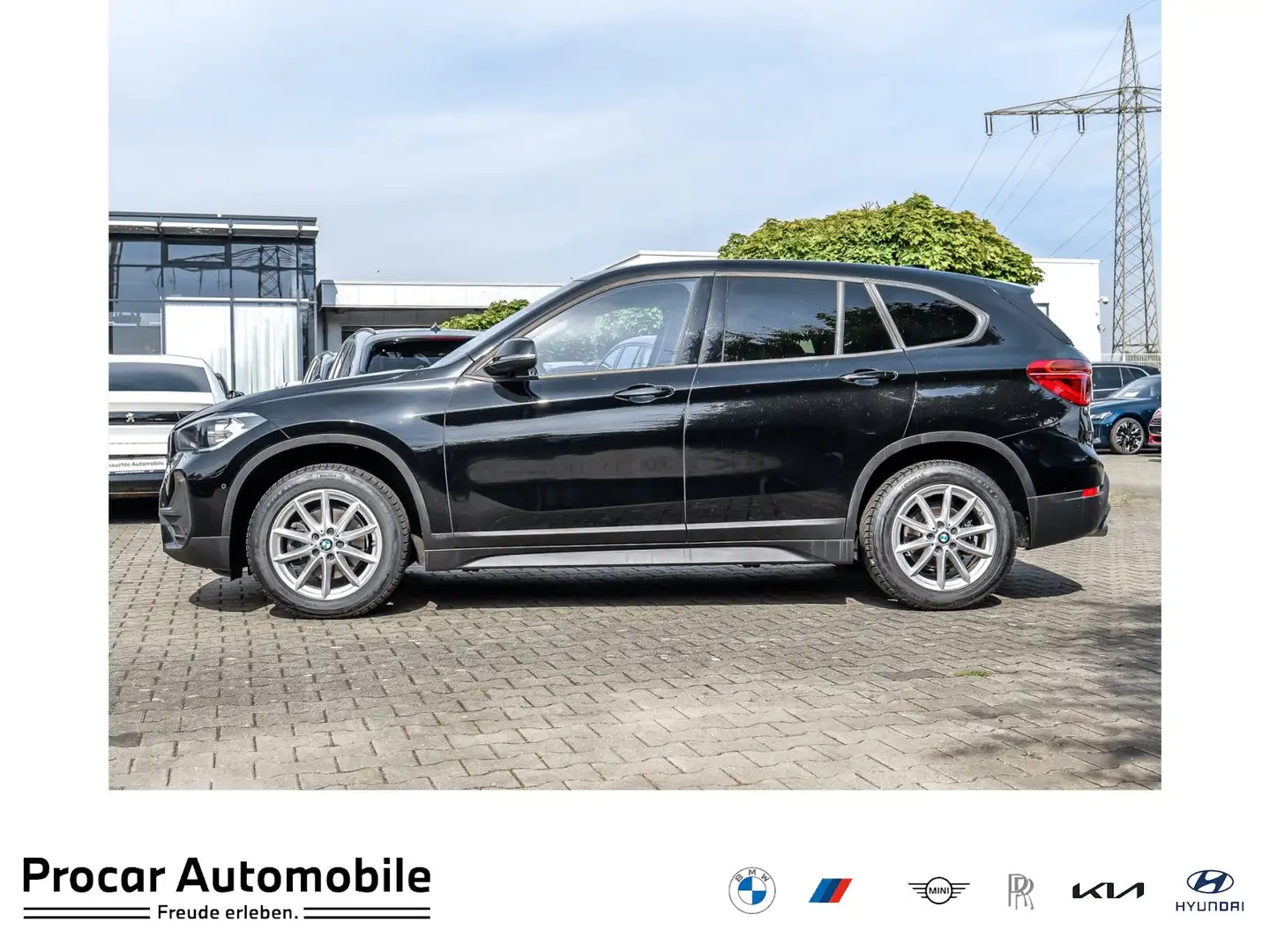 BMW X1 sDrive18i Advantage Navi+DAB+SHZ+RFK+PDC+Lordose Zwart - 1