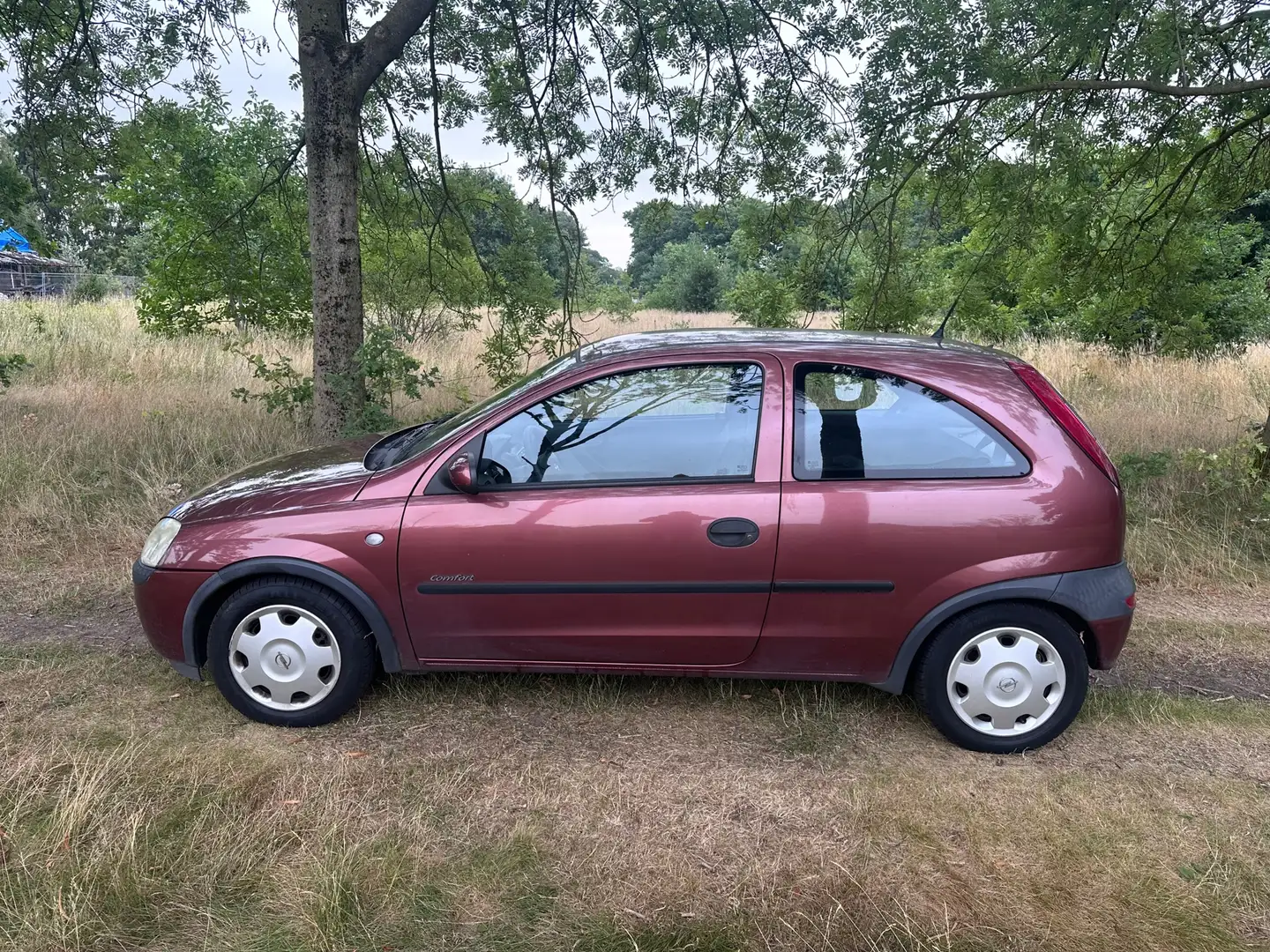 Opel Corsa 1.2-16V Comfort apk t/m 29-09-2025 Rood - 2