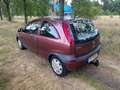 Opel Corsa 1.2-16V Comfort apk t/m 29-09-2025 Rood - thumbnail 3