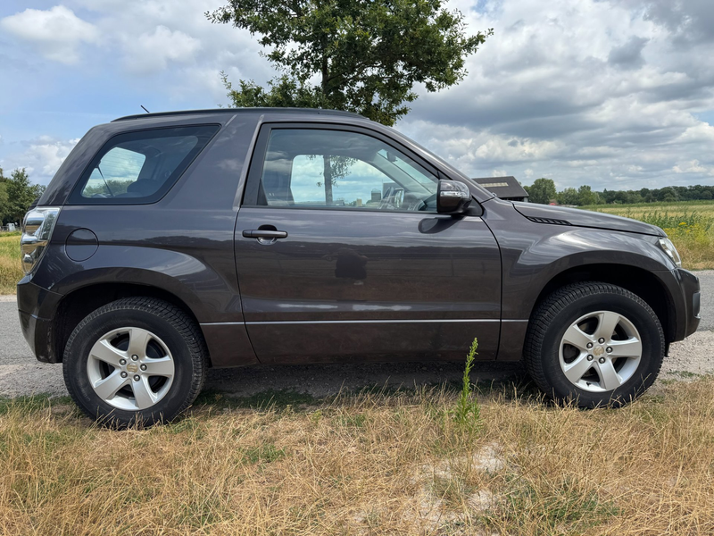 Suzuki Grand Vitara 1.6 Exclusive dealer onderhouden|climate control|t — photo 4