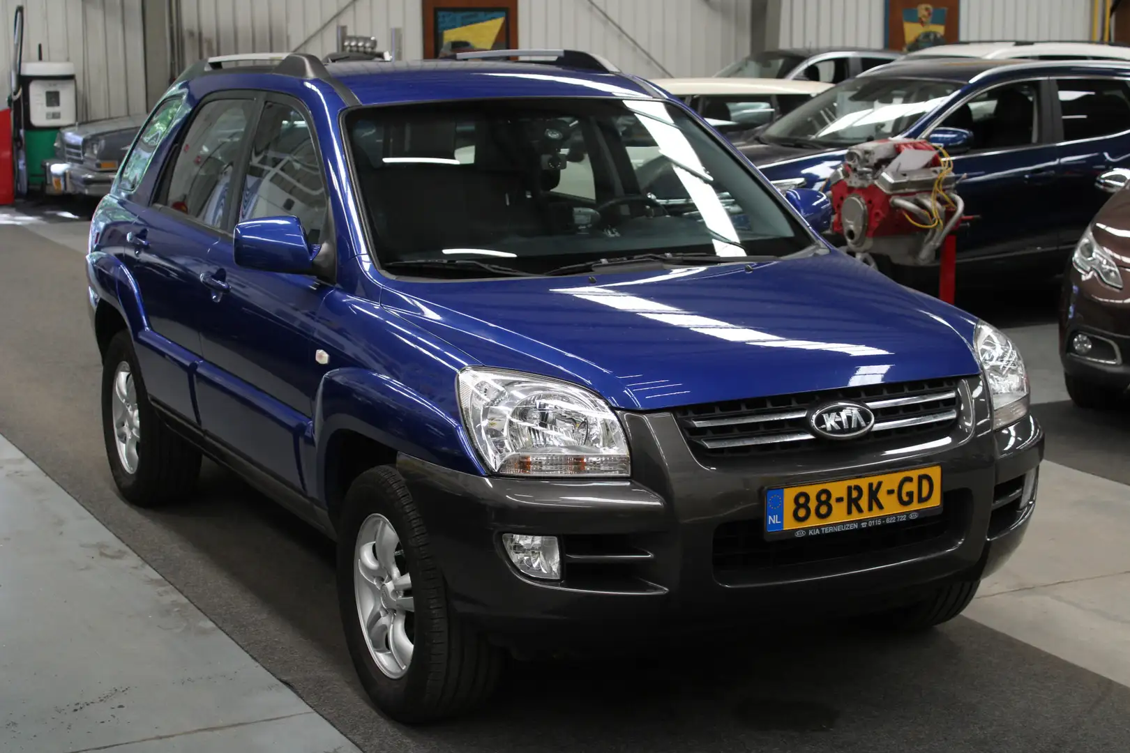 Kia Sportage 2.0 CVVT Comfort NAP, Trekhaak, Airco, Cruise cont Blauw - 2