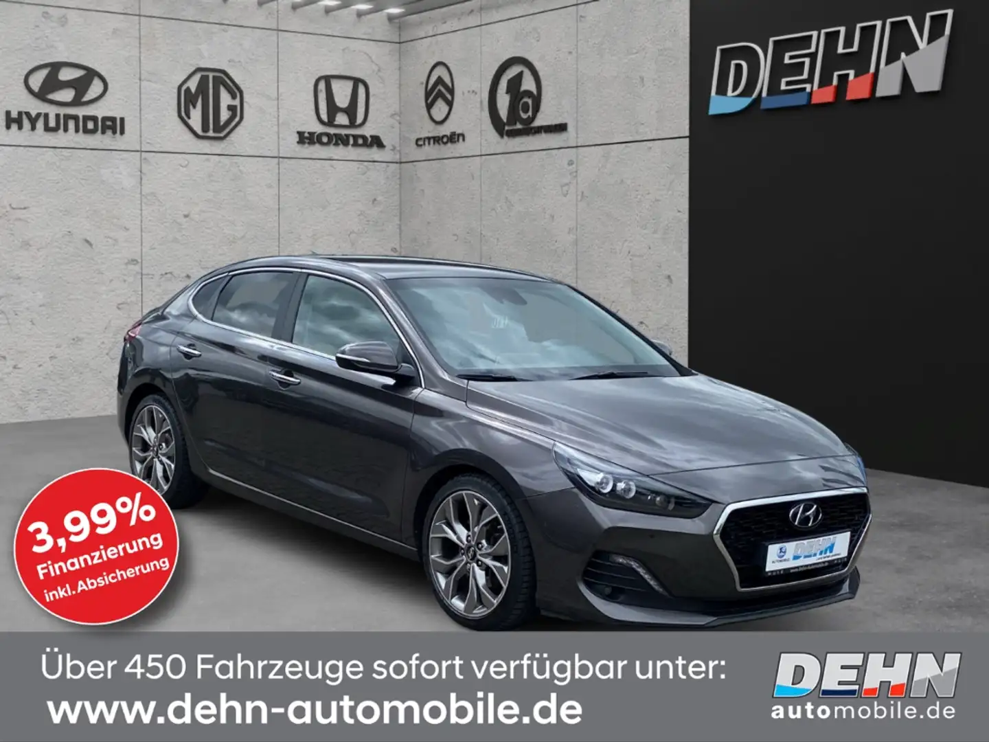 Hyundai i30 Fastback 1.4 T-GDI 7-DCT Premium Navi-/Sitzpaket i Grau - 1