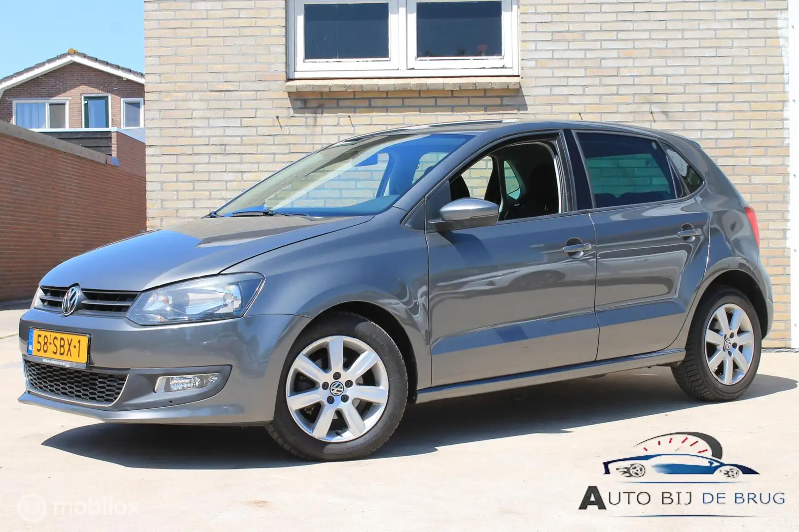 Volkswagen Polo 1.2 TSI Highline Grijs - 1