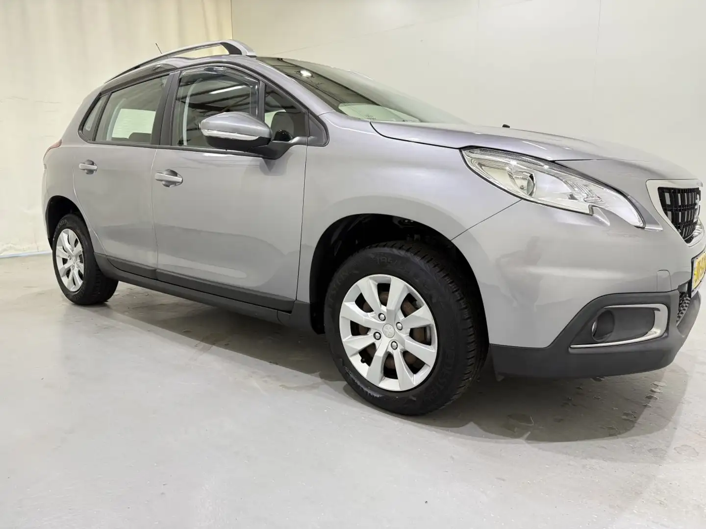 Peugeot 2008 1.2 PureTech Blue Lion Navi Grijs - 1