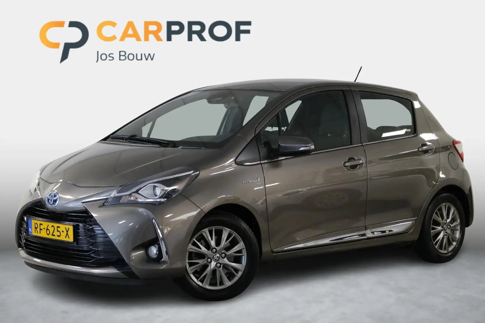 Toyota Yaris 1.5 Hybrid Executive I NAVI I CRUISE I CAMERA I LM Grijs - 1