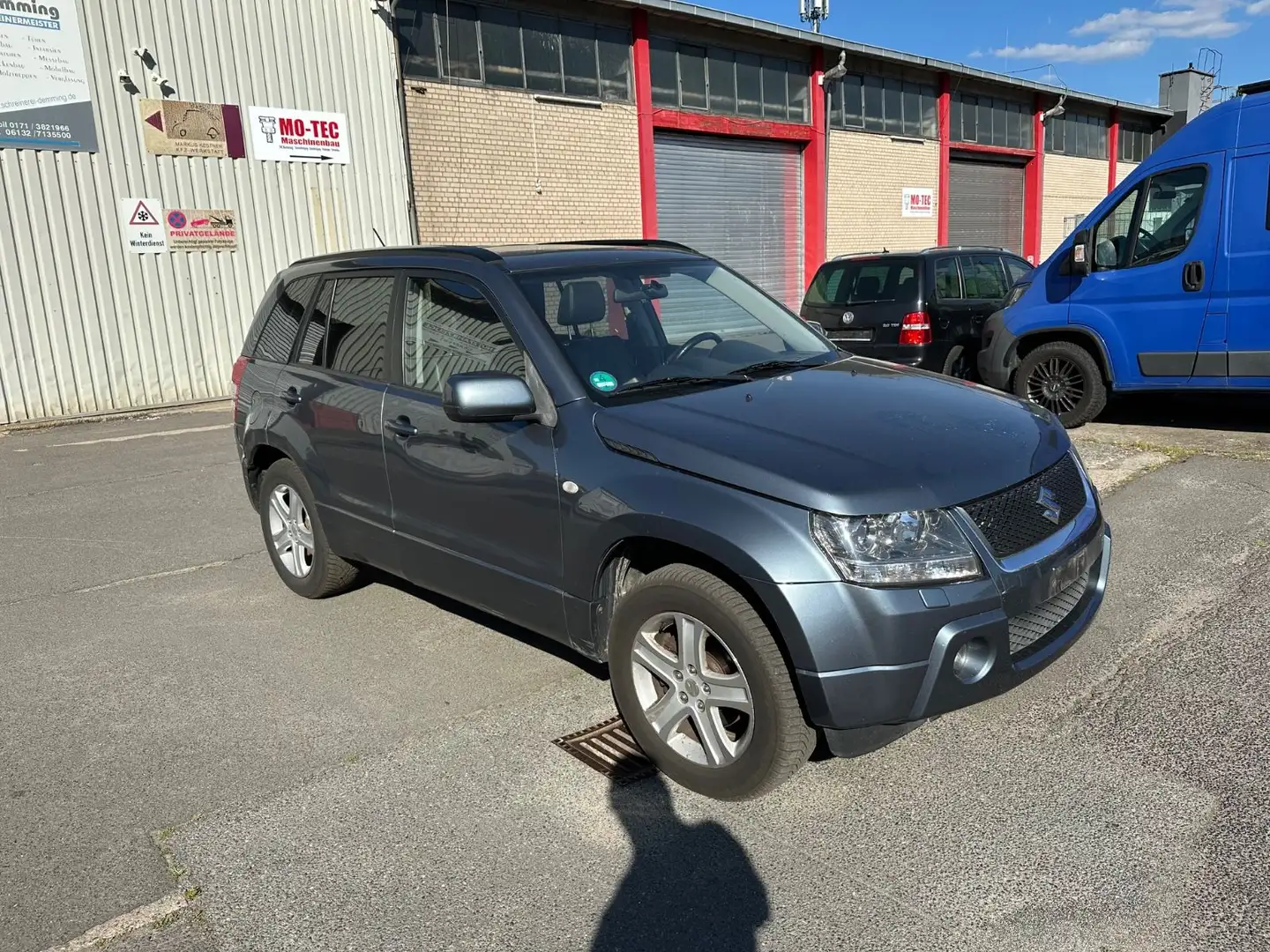 Suzuki Grand Vitara 1.9 DDiS 4x4 AHK NAVI Leder TÜV Szürke - 2