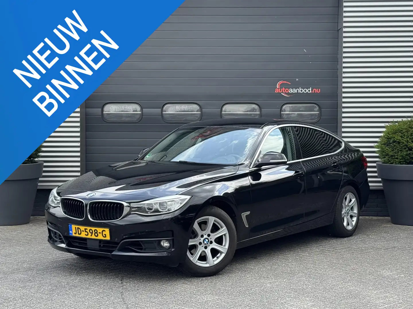 BMW 320 3-serie Gran Turismo 320i Centennial High Executiv Zwart - 1