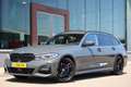BMW 320 3-serie Touring 320i High Executive M Pakket | Pan Grijs - thumbnail 1
