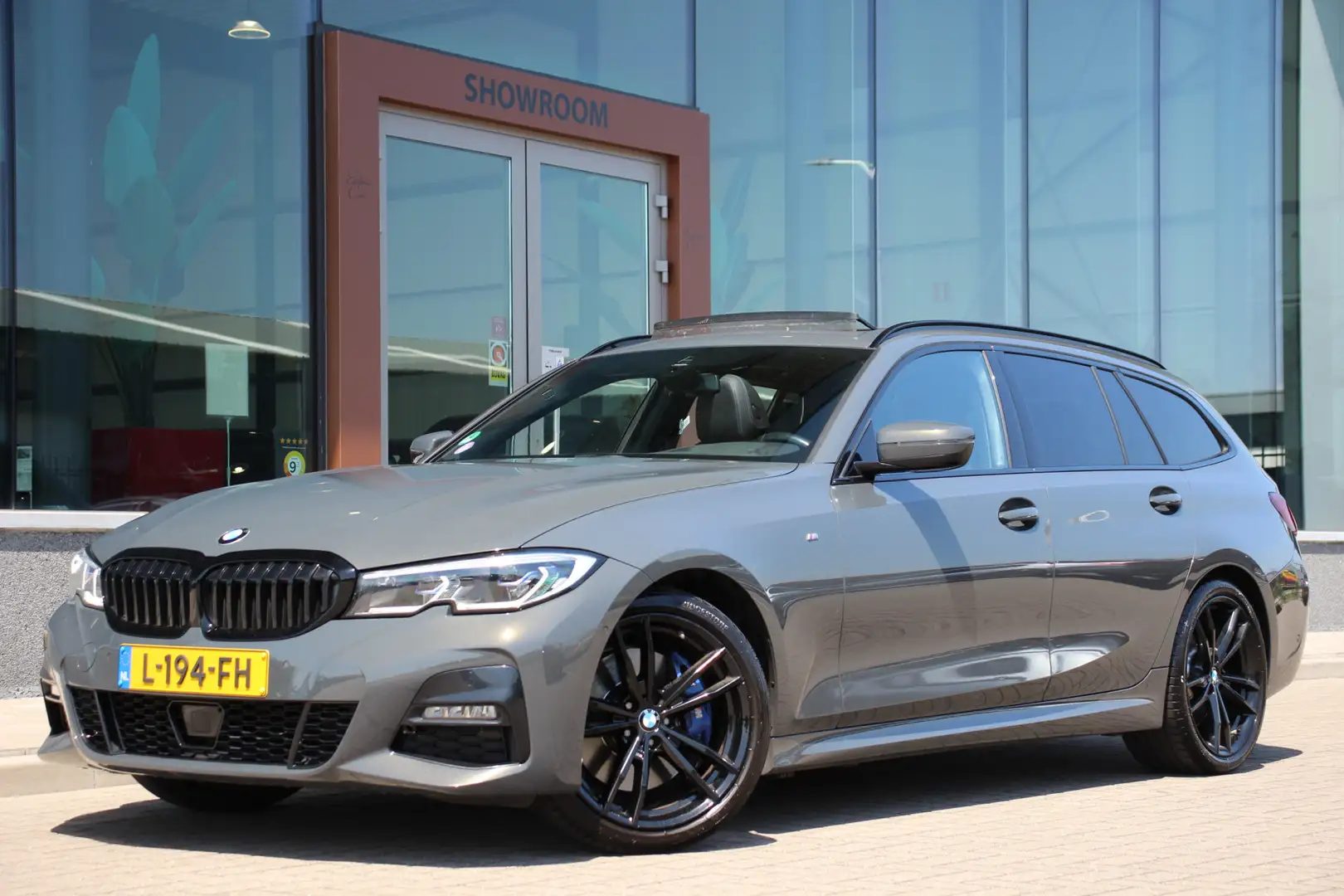 BMW 320 3-serie Touring 320i High Executive M Pakket | Pan Grijs - 1