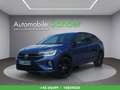 Volkswagen Taigo 1,5 TSI R-Line Aut.*IQ.LIGHT/PANORAMA/1.BESITZ* Blau - thumbnail 1