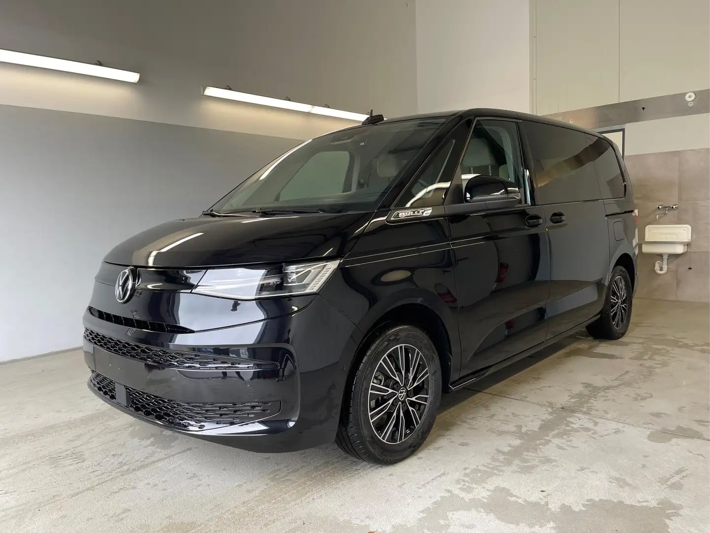 Volkswagen T7 Multivan Business eHybrid 4Motion AHK+IQ.Light+Navi+7Sit... Schwarz - 1