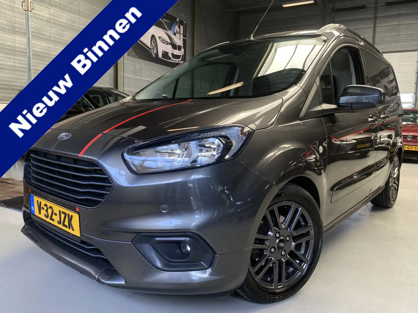 Ford Transit Courier 1.0 Ambiente Half leder, 100pk, Navi, Camera Grijs - 1