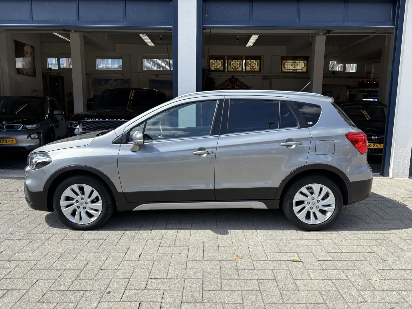 Suzuki S-Cross 1.0 Boosterjet Exclusive 1E EIGENAAR/NL AUTO/FULL Grau - 2