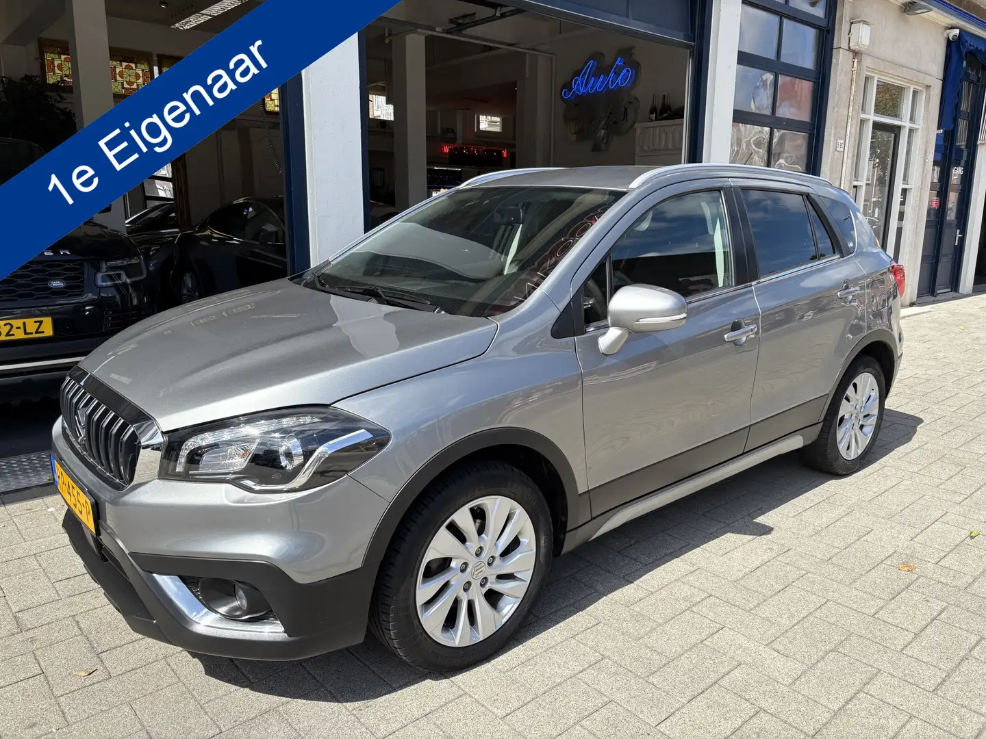 Suzuki S-Cross 1.0 Boosterjet Exclusive 1E EIGENAAR/NL AUTO/FULL Grau - 1