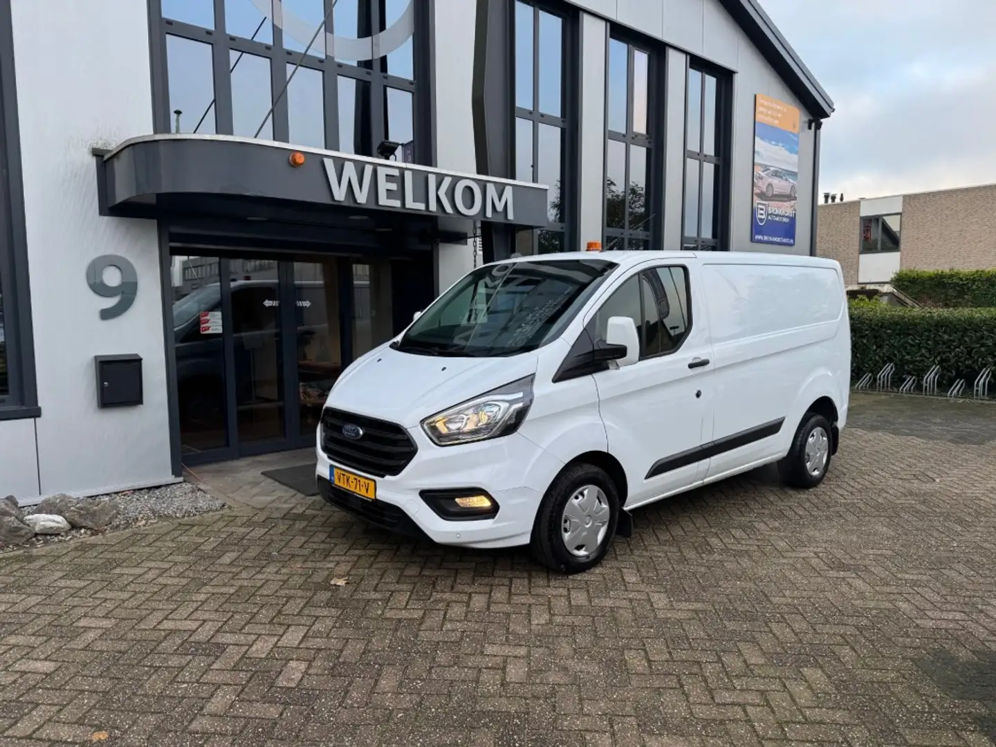 Ford Transit Custom 2.0 TDCi 130PK Airco, Navi, Cruisecntrl, PDC, Inri Wit - 1
