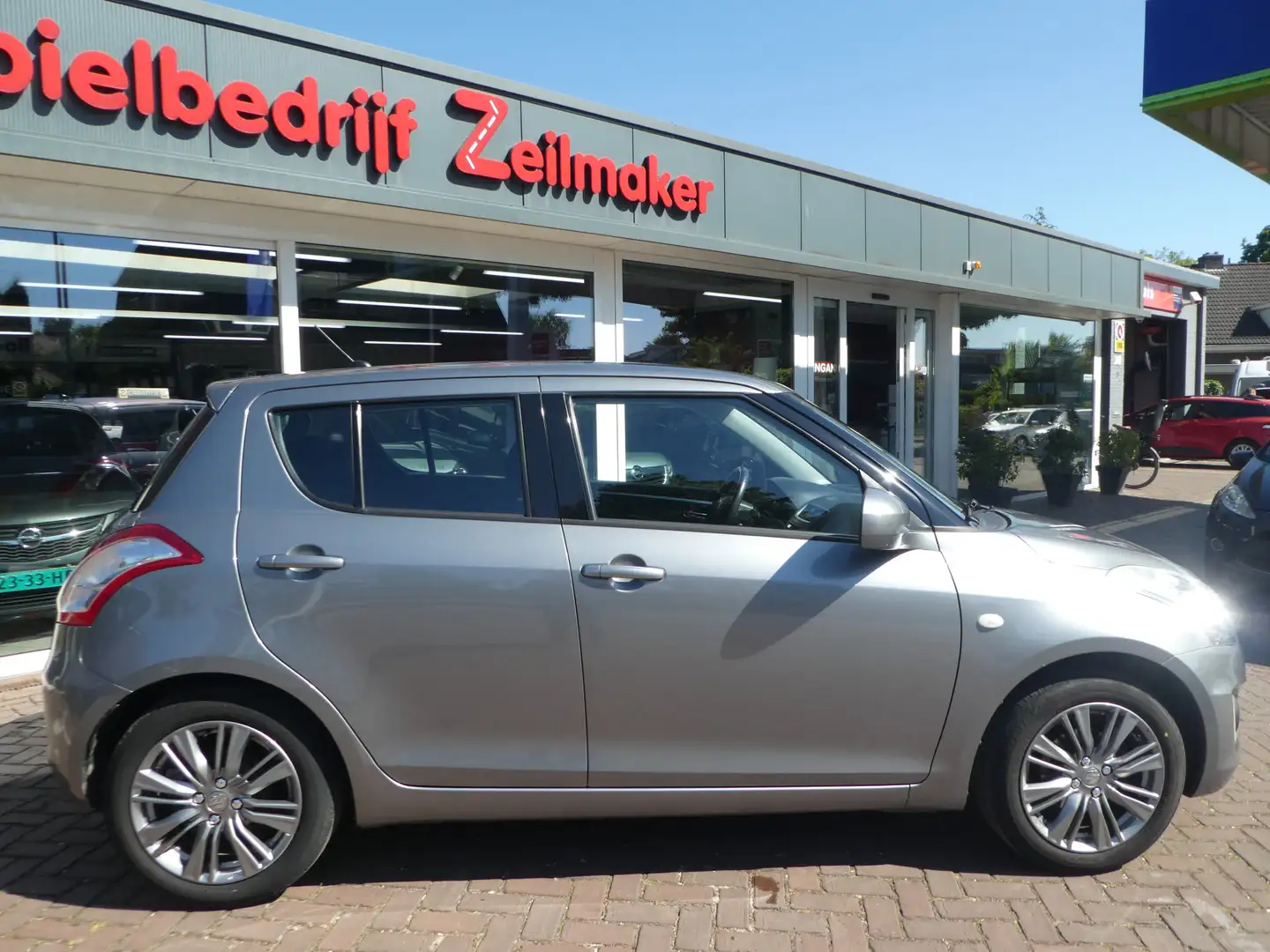 Suzuki Swift 1.2 Comfort EASSS Airco, Stoelverw, trekhaak, 16 " Grijs - 2