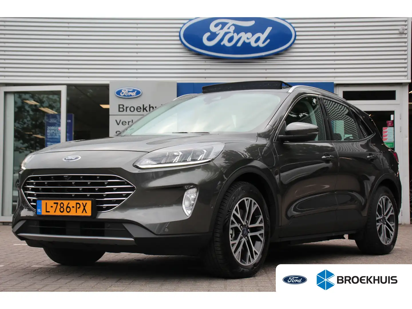 Ford Kuga 2.5 PHEV Titanium | NL-AUTO | DEALER-OH! | PANODAK Grijs - 1