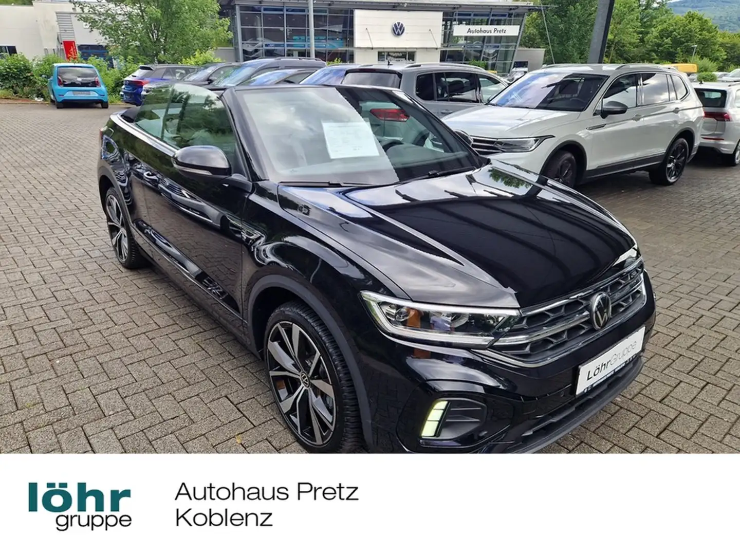 Volkswagen T-Roc Cabriolet 1.5 TSI DSG R-Line LED-Sch., RFK, Nav... Zwart - 1