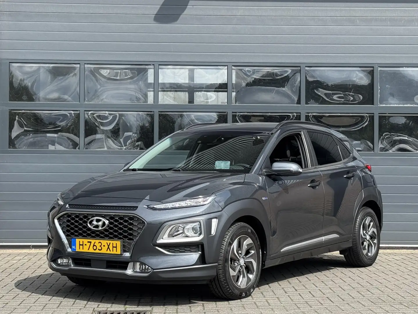 Hyundai KONA 1.6 GDI HEV FASHION I TREKHAAK I AUTOMAAT I CARPLA Grey - 1