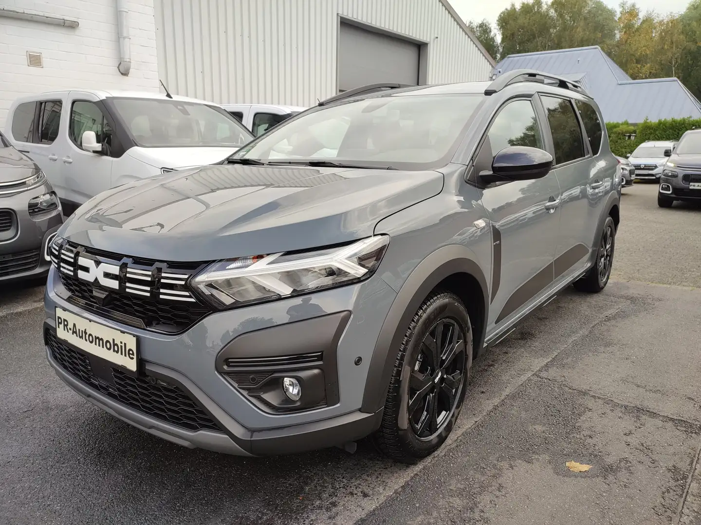 Dacia Jogger Extreme+ Hybrid 7 Sitze Klimaaut/Navi+Cam Grau - 1