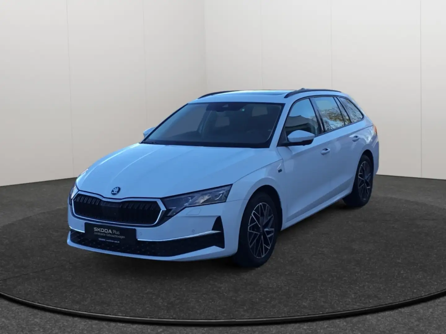 Skoda Octavia Combi 2.0TDI DSG Tour Matrix AHK Navi 360° ACC Weiß - 1