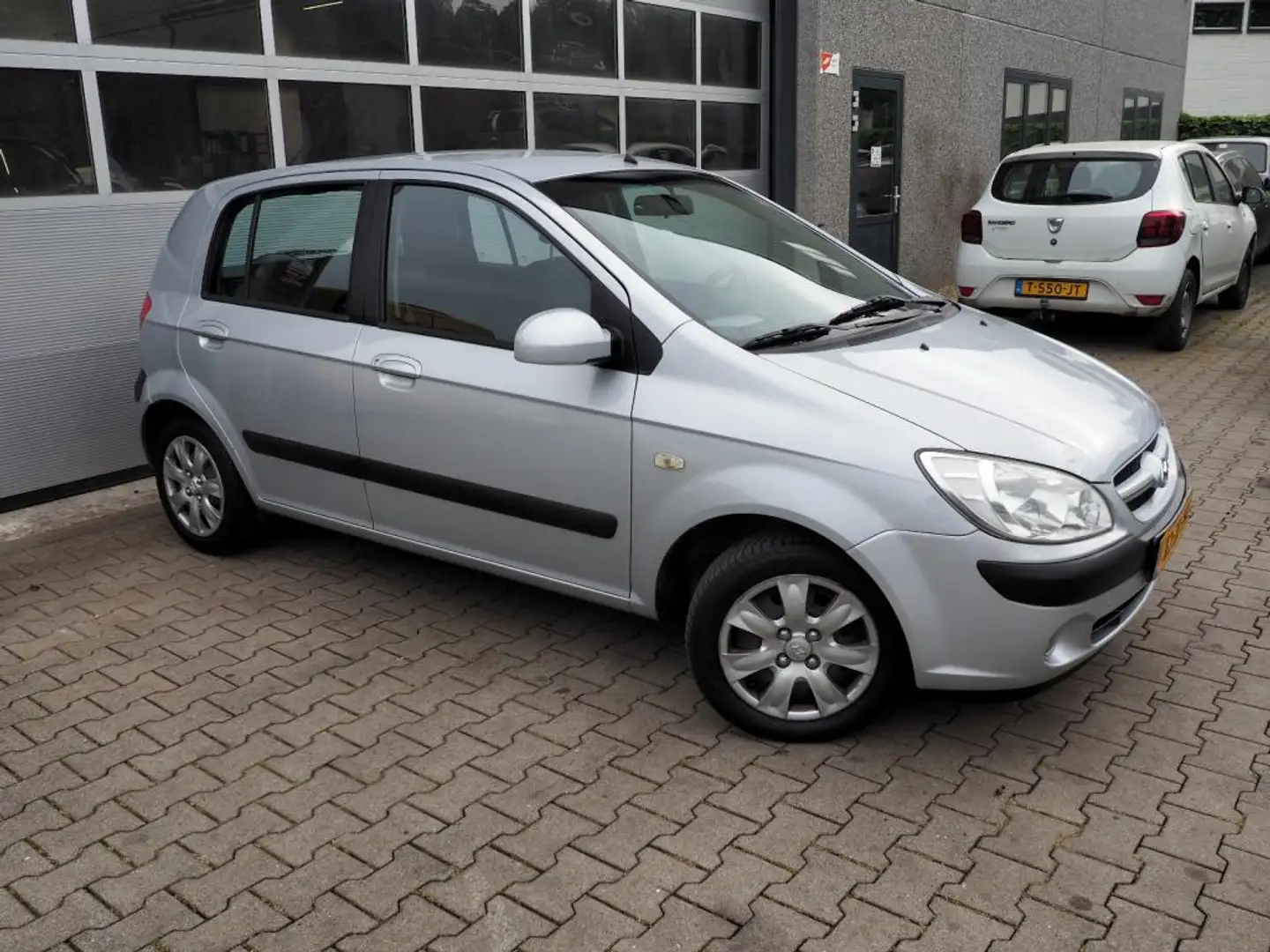 Hyundai Getz 1.4i ActiveVersion AIRCO 5 DEURS ELEK. PAKKET Grau - 1