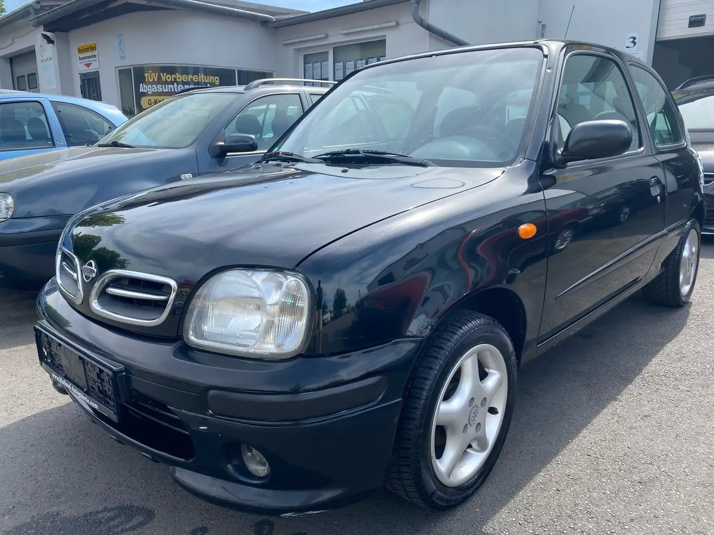 Nissan Micra 1.0 Comfort Klima/Gepflegt/Alufelgen/TÜV NEU... Negru - 1