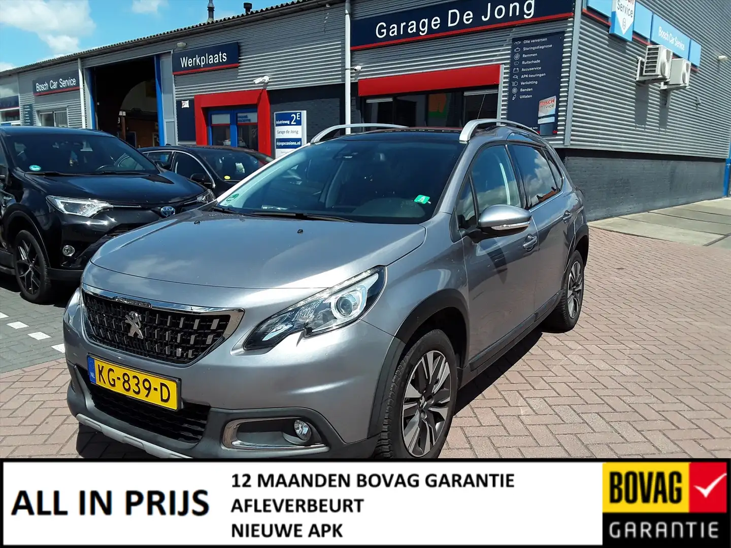 Peugeot 2008 1.2 PureTech 110pk Blue Lease Executive Grigio - 1