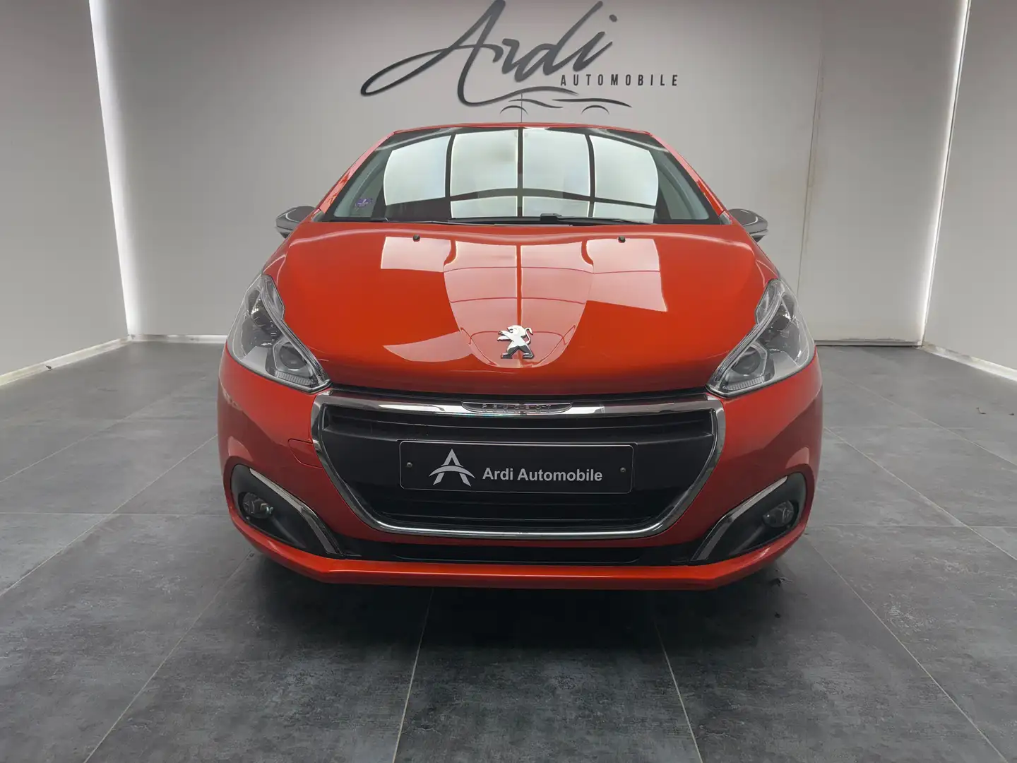 Peugeot 208 1.2i Style*CARPLAY*GPS*1ER PROP*GARANTIE* Oranje - 2