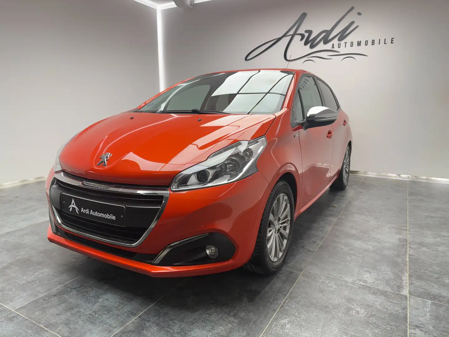 Peugeot 208 1.2i Style*CARPLAY*GPS*1ER PROP*GARANTIE* Oranje - 1