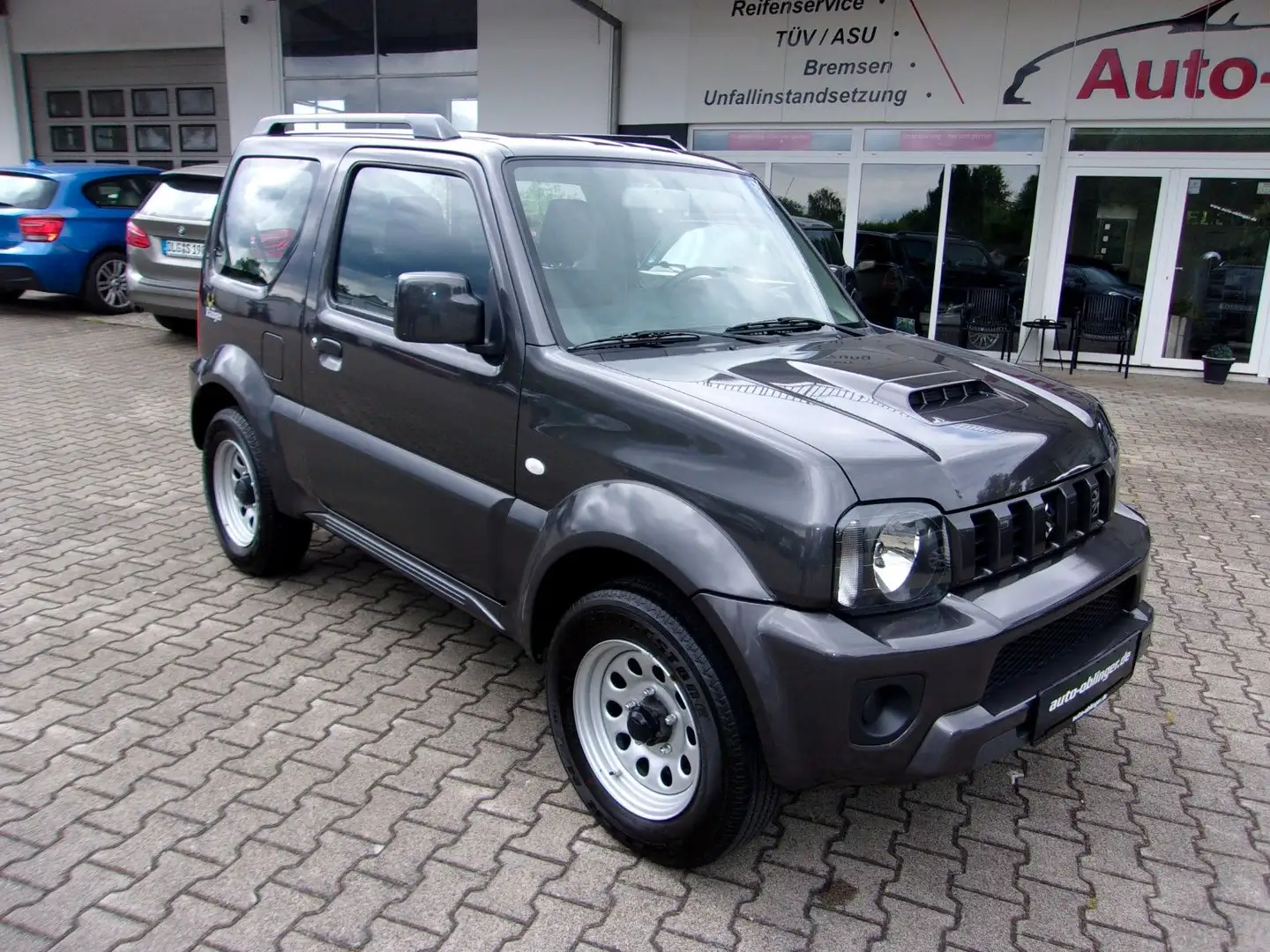 Suzuki Jimny 1.3 ALLGRIP Comfort Ranger Grau - 1