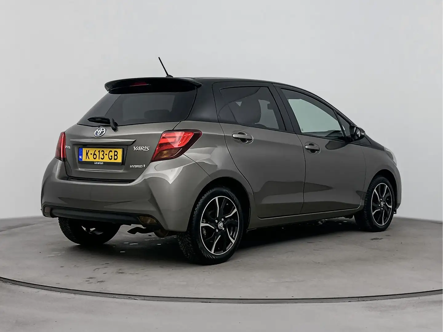 Toyota Yaris 1.5 Hybrid Dynamic Bi-Tone | Climate control | Lic Bruin - 2