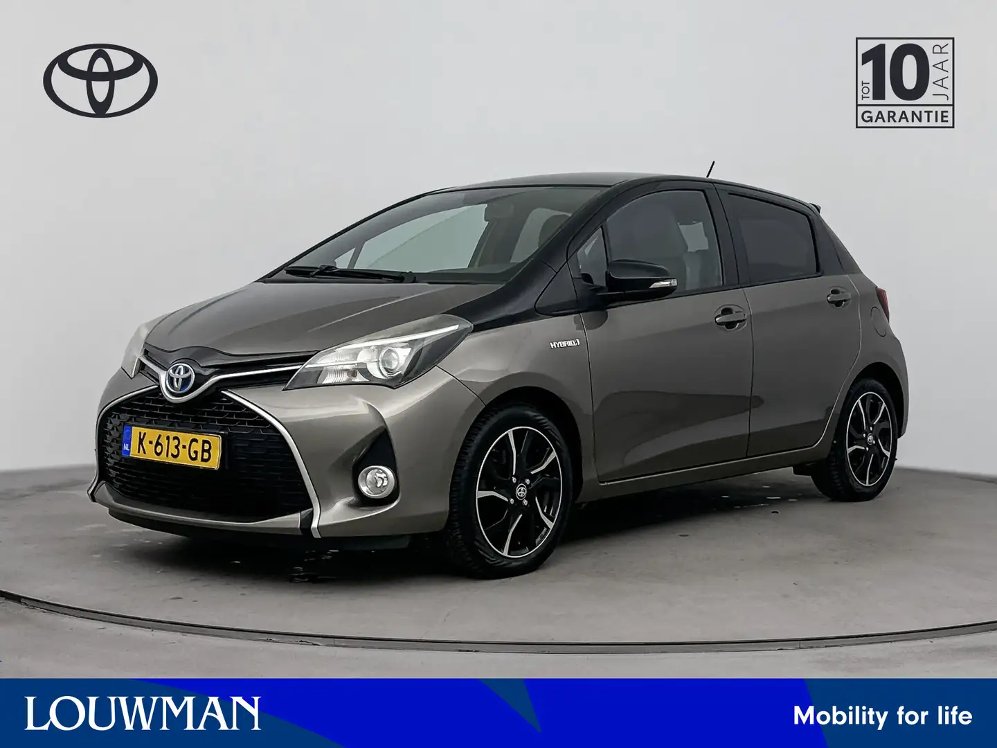 Toyota Yaris 1.5 Hybrid Dynamic Bi-Tone | Climate control | Lic Bruin - 1