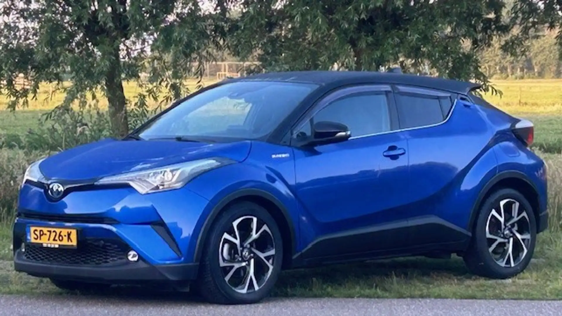 Toyota C-HR 1.8 Hybrid BI-TONE NAVIGATIE, DAB RADIO, JBL SYSTE Blauw - 1