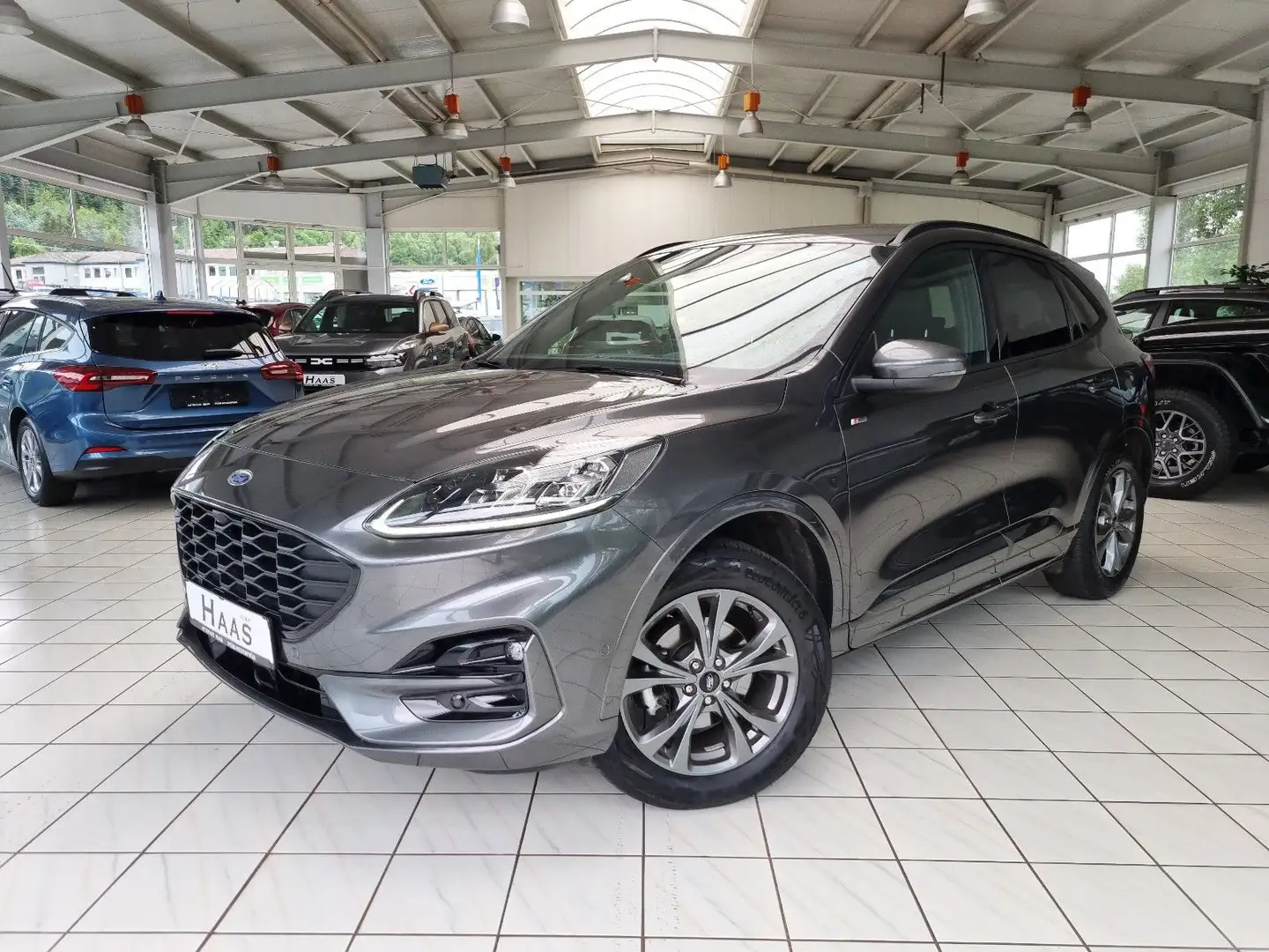 Ford Kuga Hybrid ST-Line X FHEV 190 4x4 Autom. #AHK Grau - 1