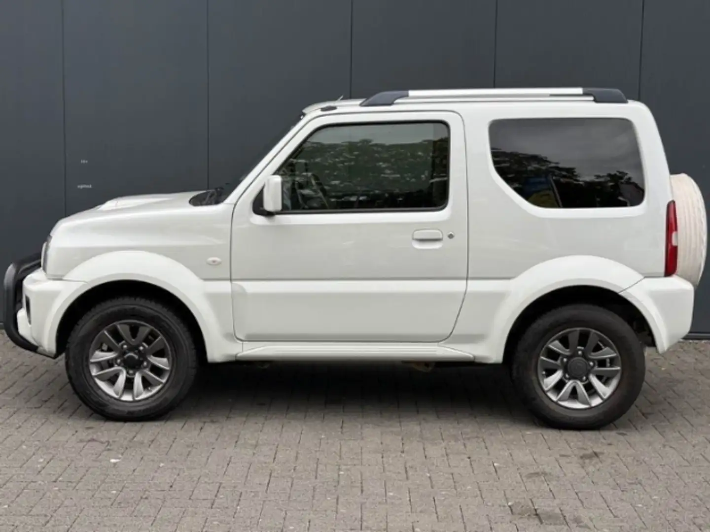 Suzuki Jimny Style Lim. 1.3 +ALLGRIP+NAVI+SHZ+ALLRAD+VOLLLEDER Weiß - 2