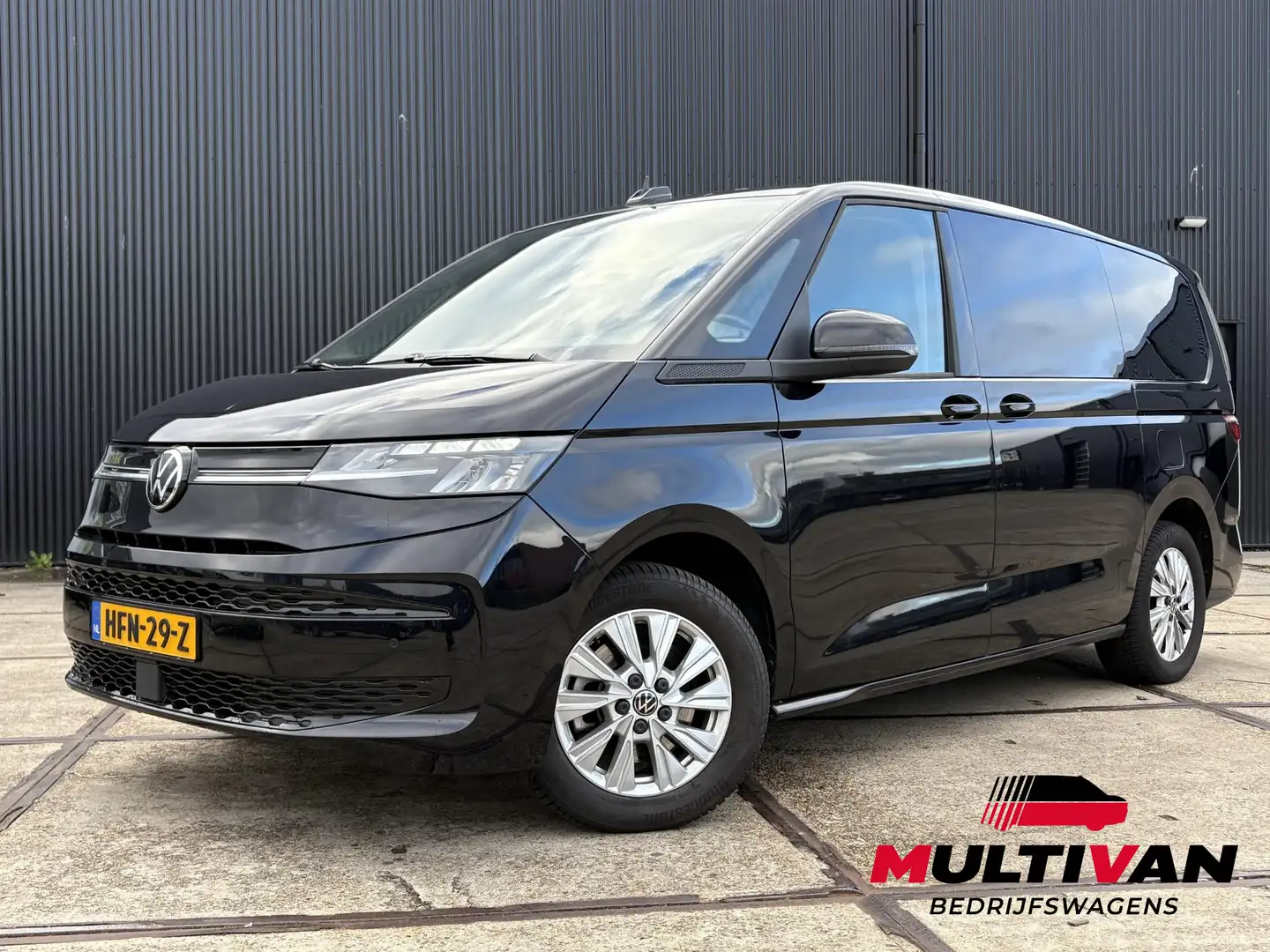 Volkswagen T7 Multivan 1.4 eHybrid L1H1 218PK | 2x Schuifd. Elektrisch | Noir - 1