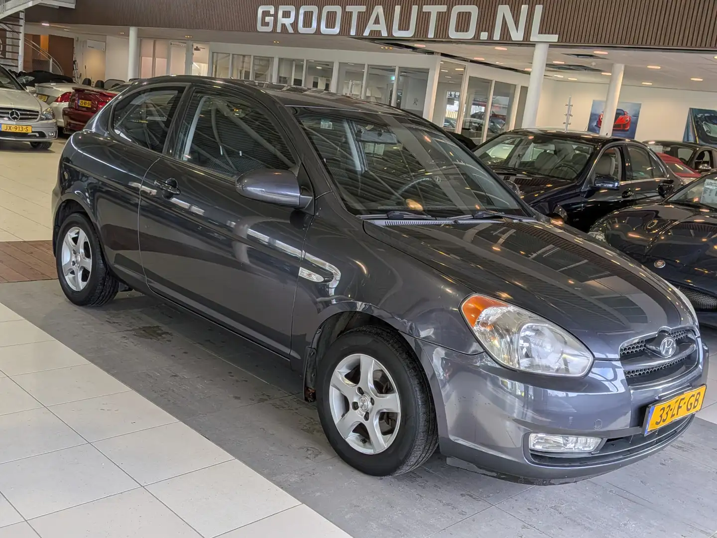 Hyundai ACCENT 1.6i Dynamic Airco, Stuurbekrachtiging siva - 1