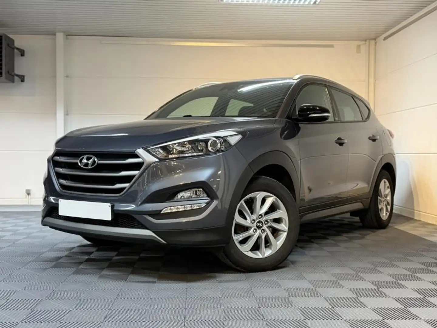 Hyundai TUCSON 1.6GDi 132cv 2WD gris 06/18 Airco GPS Capteurs Grau - 1